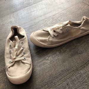 tan cloth tennis shoes